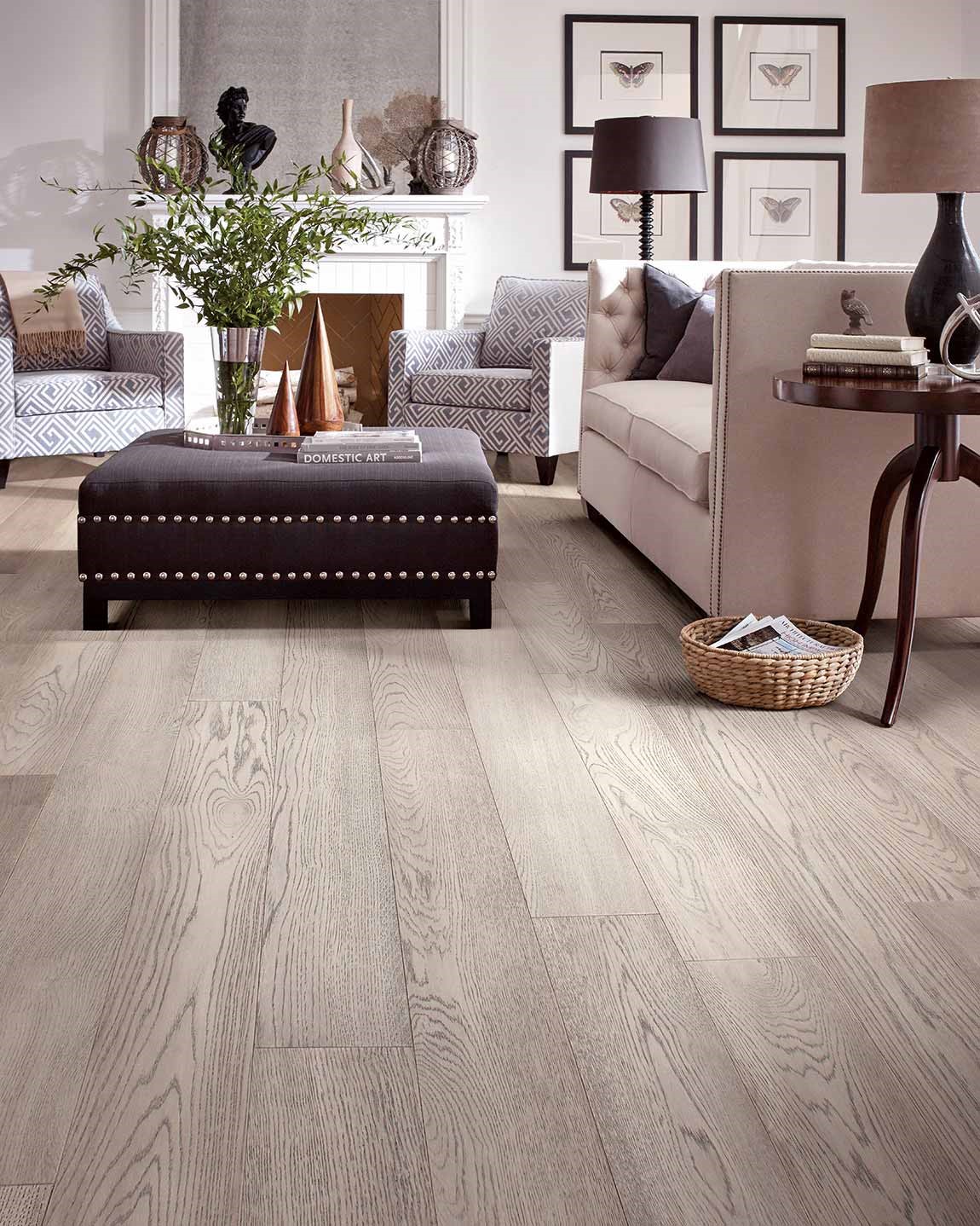wire brushed light colored flooring in classically styled living room